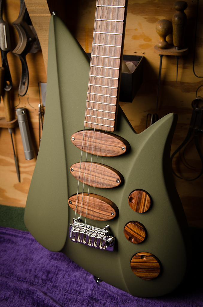 Custom pickups, pickup covers and control knobs.