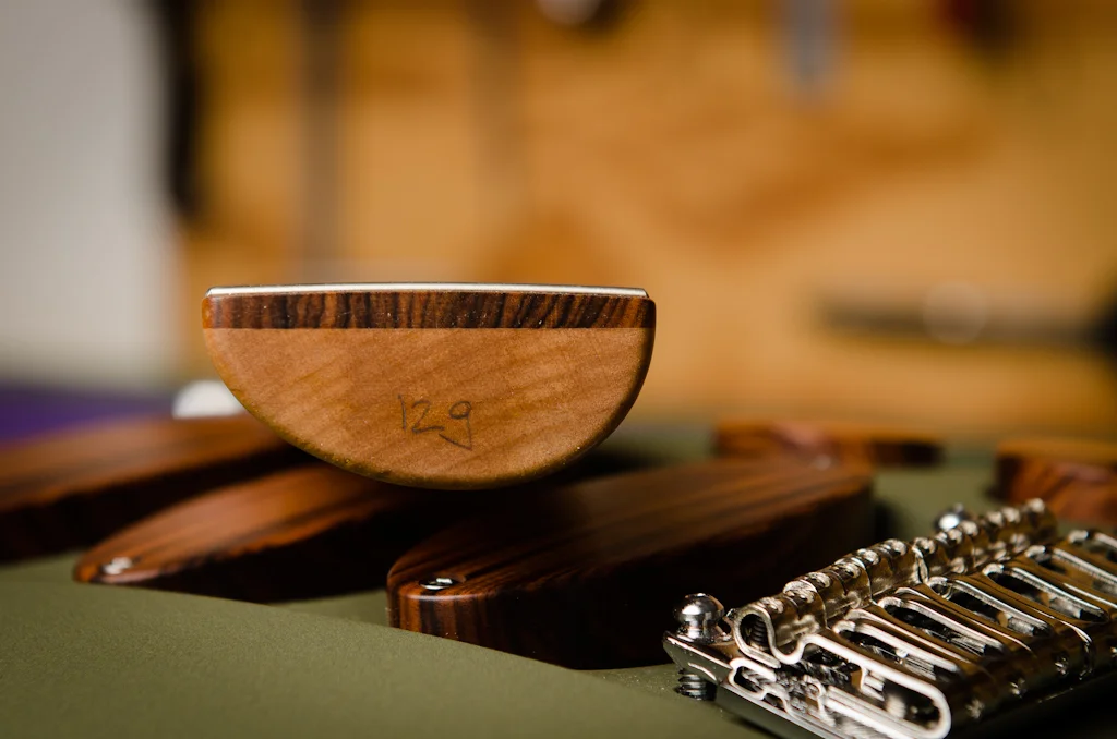 Asymmetric neck profile: note the treble side is thicker than the bass side.