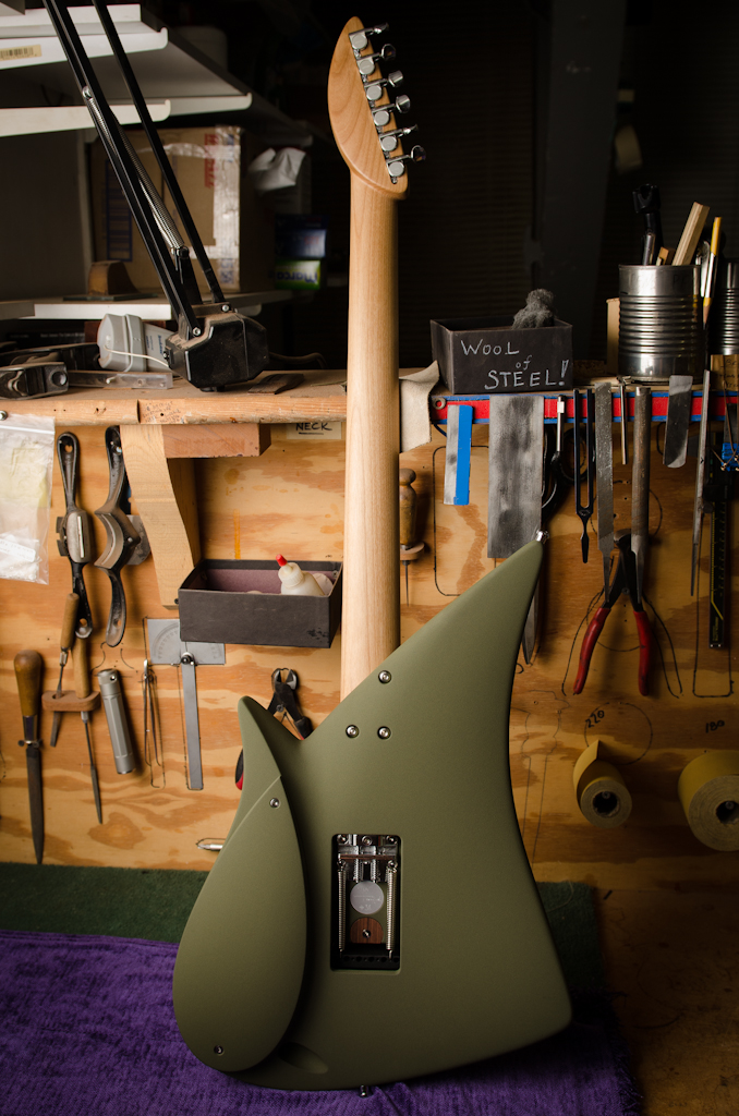 The guitar is strung up and the neck restored to new condition.