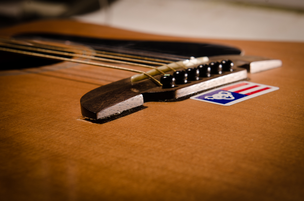 Medium gauge strings are too much for this glue joint.
