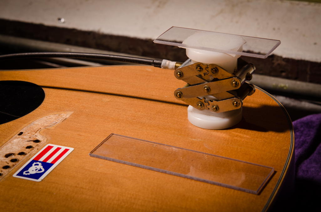 This jack will be used to support the lower bout top crack and keep it aligned during the repair. Note the piece of plexiglass on the jack will be inside while the other piece is used on the outside.