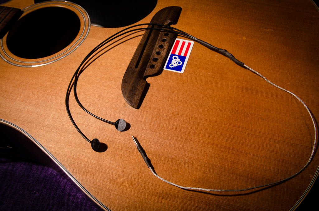 The customer and I decided on a D-TAR Soundspots pickup. This is a passive transducer-style pickup and was able to splice into the original Alvarez preamp. The two piezo elements are super glued inside the guitar on the bridge plate.