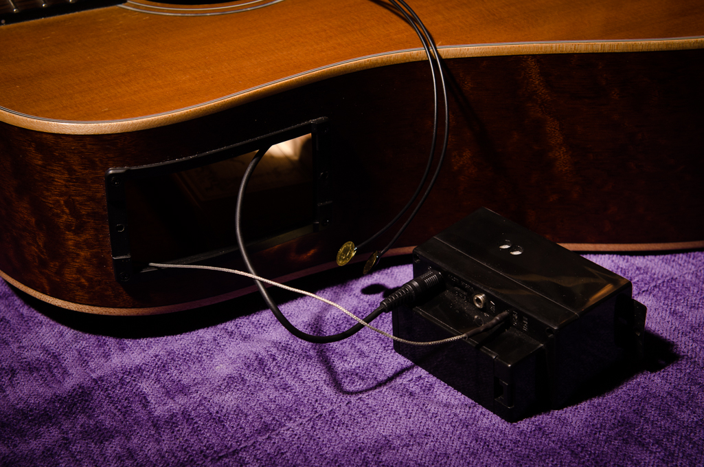 The new pickup spliced into the original pickup lead. The pickup is the shielded cable and the other wire runs to the output jack.
