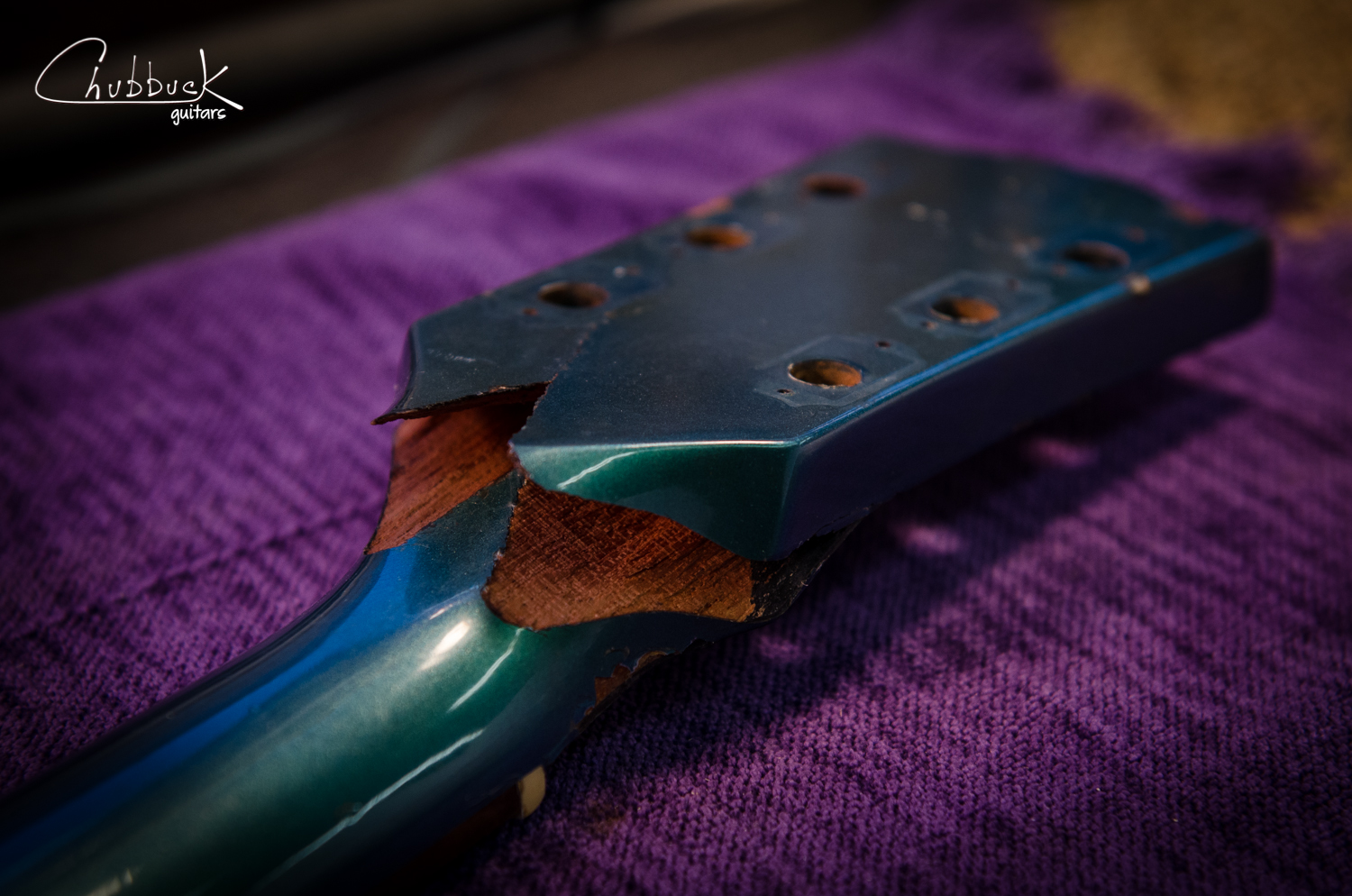 It took roughly 30 minutes of patiently steaming, heating and hand pressure to finally work the joint open. I cleaned out the old glue with more steam and aligned any mahogany fibers that didn't mesh in the joint.