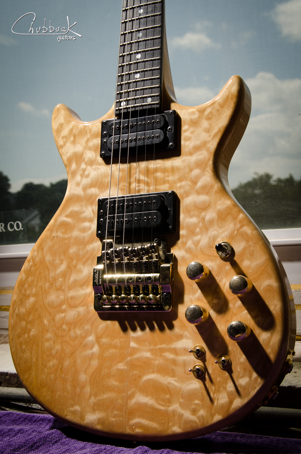 1987 Carvin DC-150 with a clear finish.