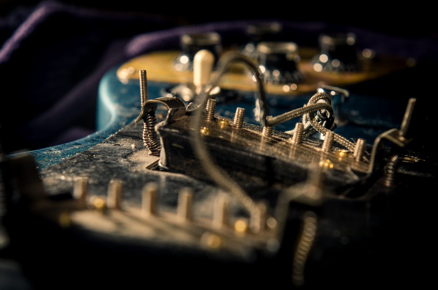 Boom! Check out the carnage underneath the pick guard.