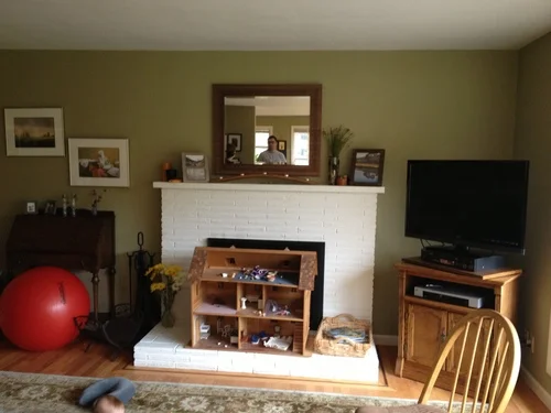 Before: Painted brick fireplace