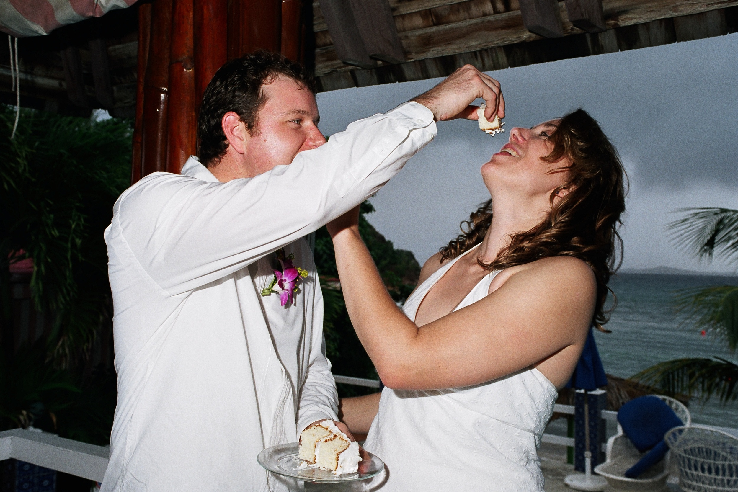 Me being force-fed my own wedding cake almost 11 years ago