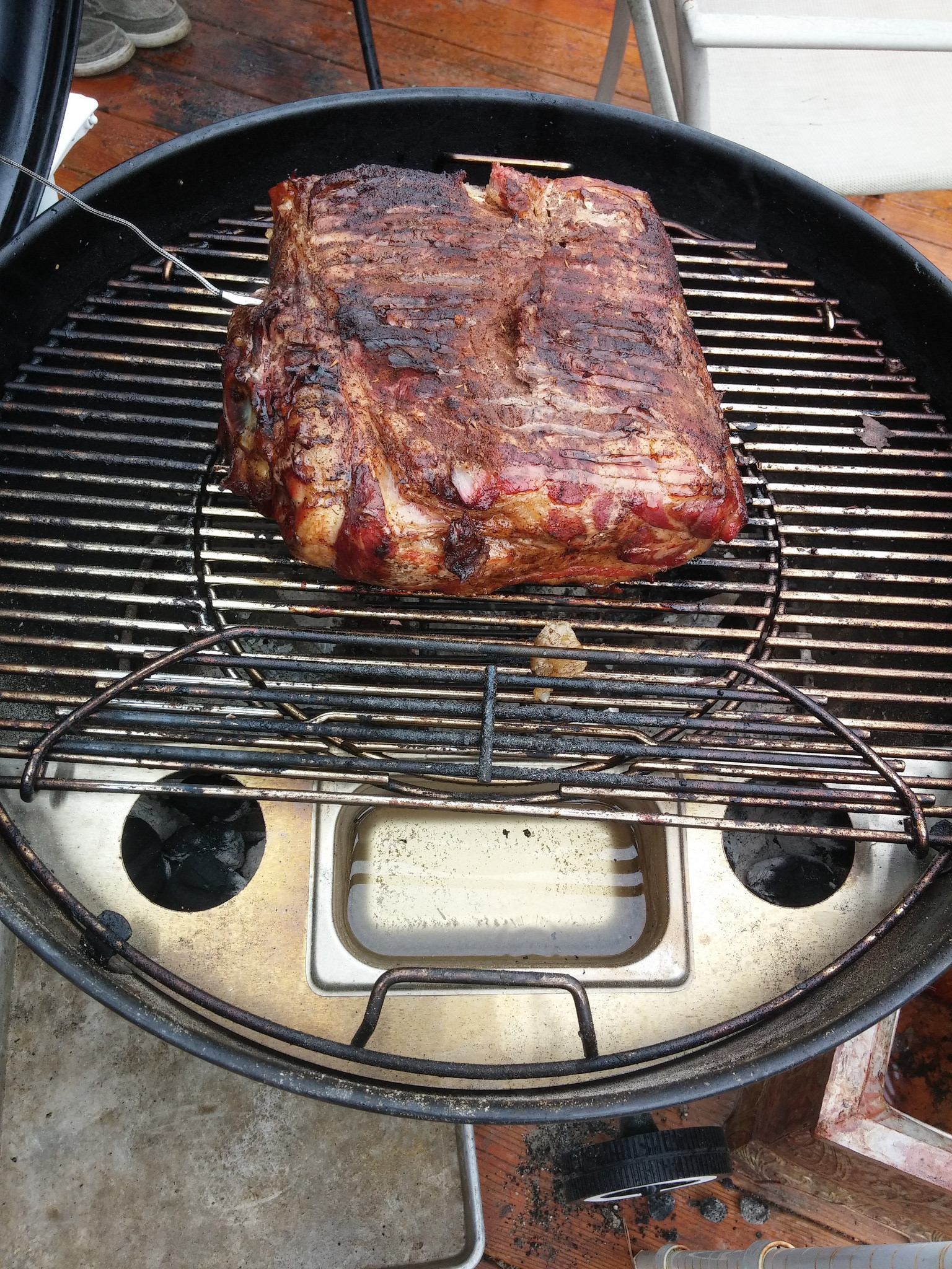 The metal contraption under the grill is the smokenator. Eric says it's "pretty cool." 