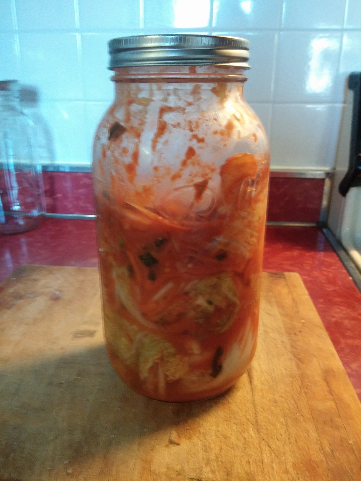 One of three half-gallon jars of kimchi. 