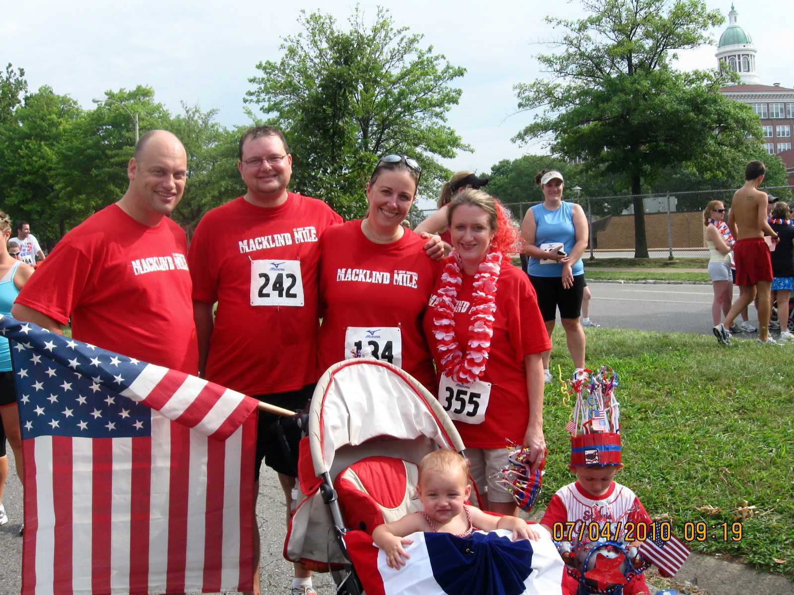 Me and Eric with our friends John and Maddisson, and their kids, back in 2010, doing the Macklind Mile. 