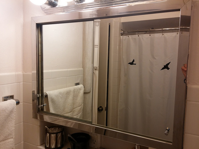 Two doors! Also it's quite difficult to take a picture of a mirrored cabinet without taking a selfie. Just sayin.' Toes in the last pic, fingers in this one. 