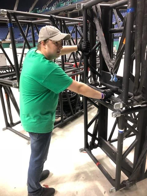 Josh Scovern working on the set of Marvel Universe LIVE! while wearing his Gig Gloves ONYX. 