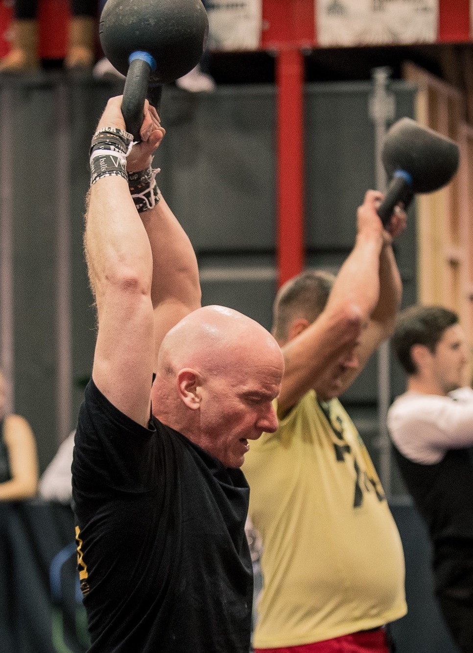Coach Craig working through some kettlebell swings after burning 12 calories on the Assault Bike.