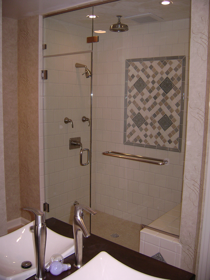 Custom euro door and panel steam enclosure with transom and towel bar