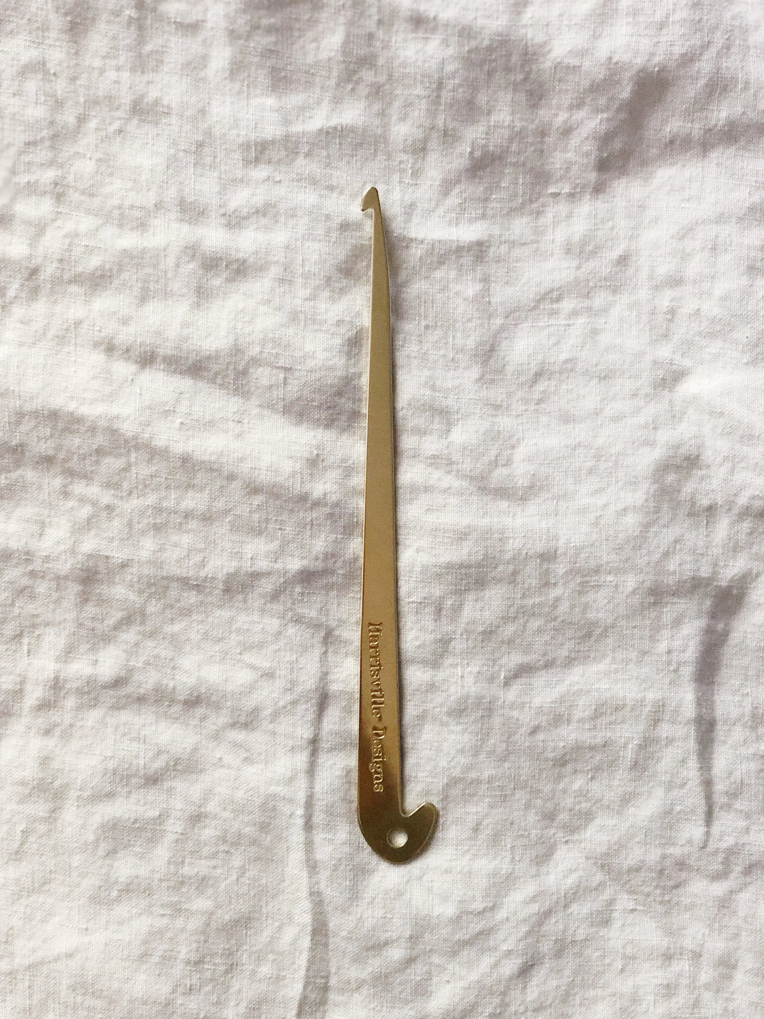 brass threading/sley hook — Weaver House