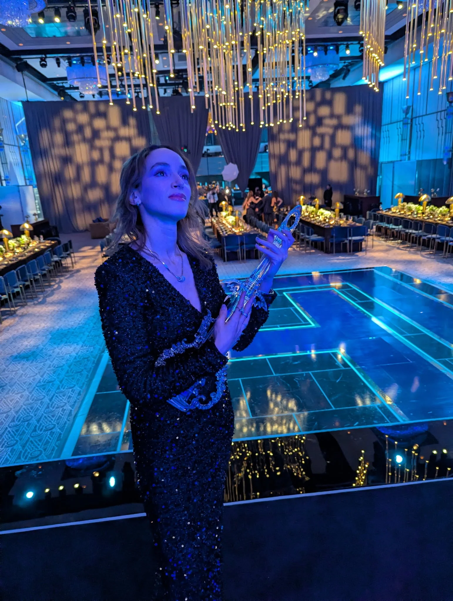 a woman with an acrylic electric violin