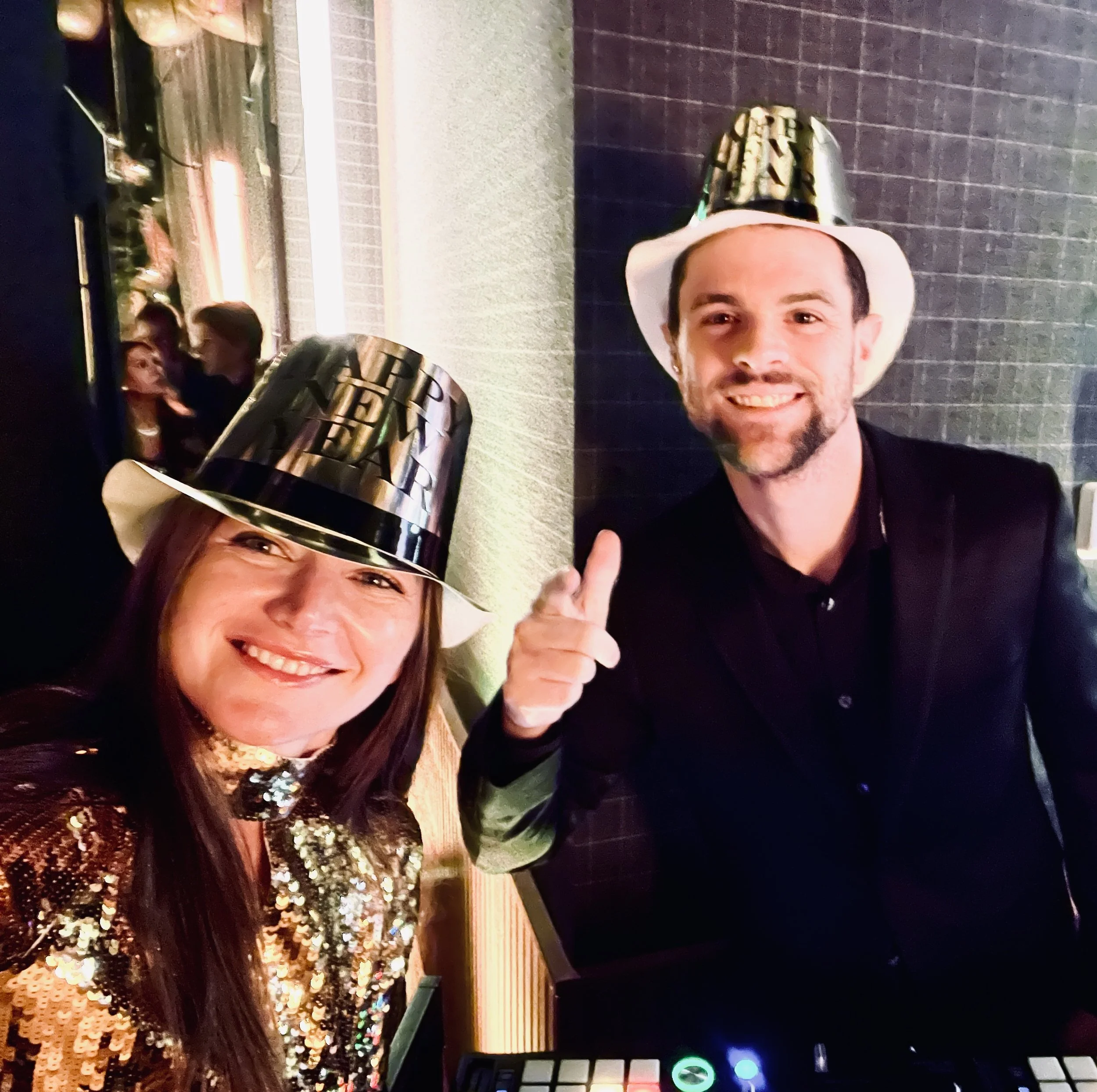 Female electric violinist Nadia Khodakovska performing with Dj Haydn on New Year's Eve at the Angelo's Aspen CO