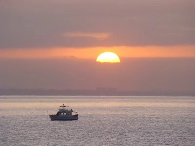 Glorious sunrise over the lifeguard's boat at the Malibu Pier. The greatest mistake you can make is to be afraid of making one. …Elbert Hubbard