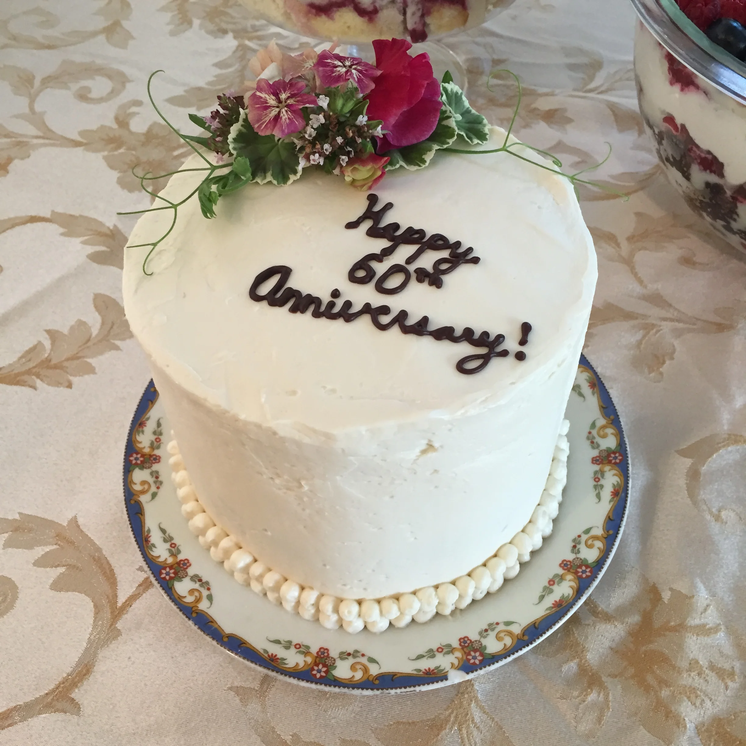 I was in charge of cake and flowers for the party - two of my favourite things! I made a four layer cake (alternating vanilla and chocolate) with raspberry and vanilla swiss buttercream. I loved making the little flower arrangement on top of the cake with beautiful geranium leaves and sweet pea tendrils. 