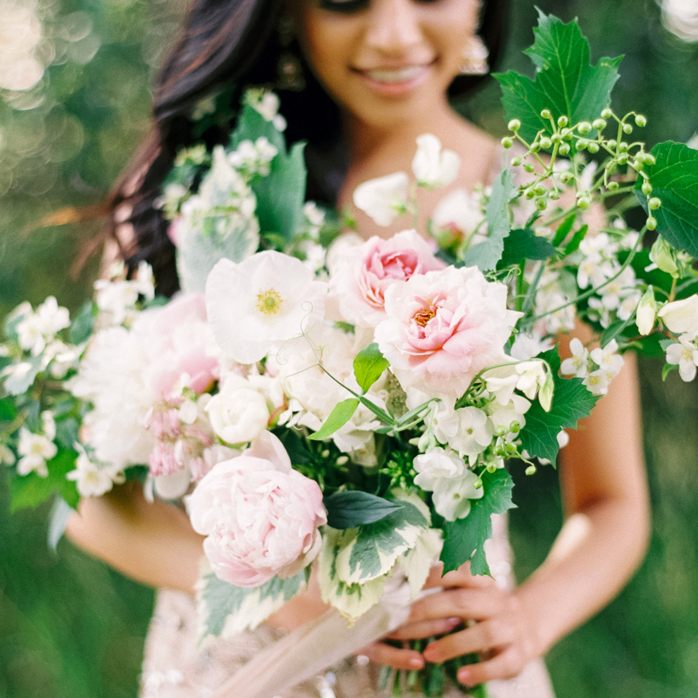 Early July (photo by Milton Photography ) - peonies, mock orange, phlox, astrantia, viburnum , sweet peas, Dicentra formosa, roses, goutweed, alliums, poppies