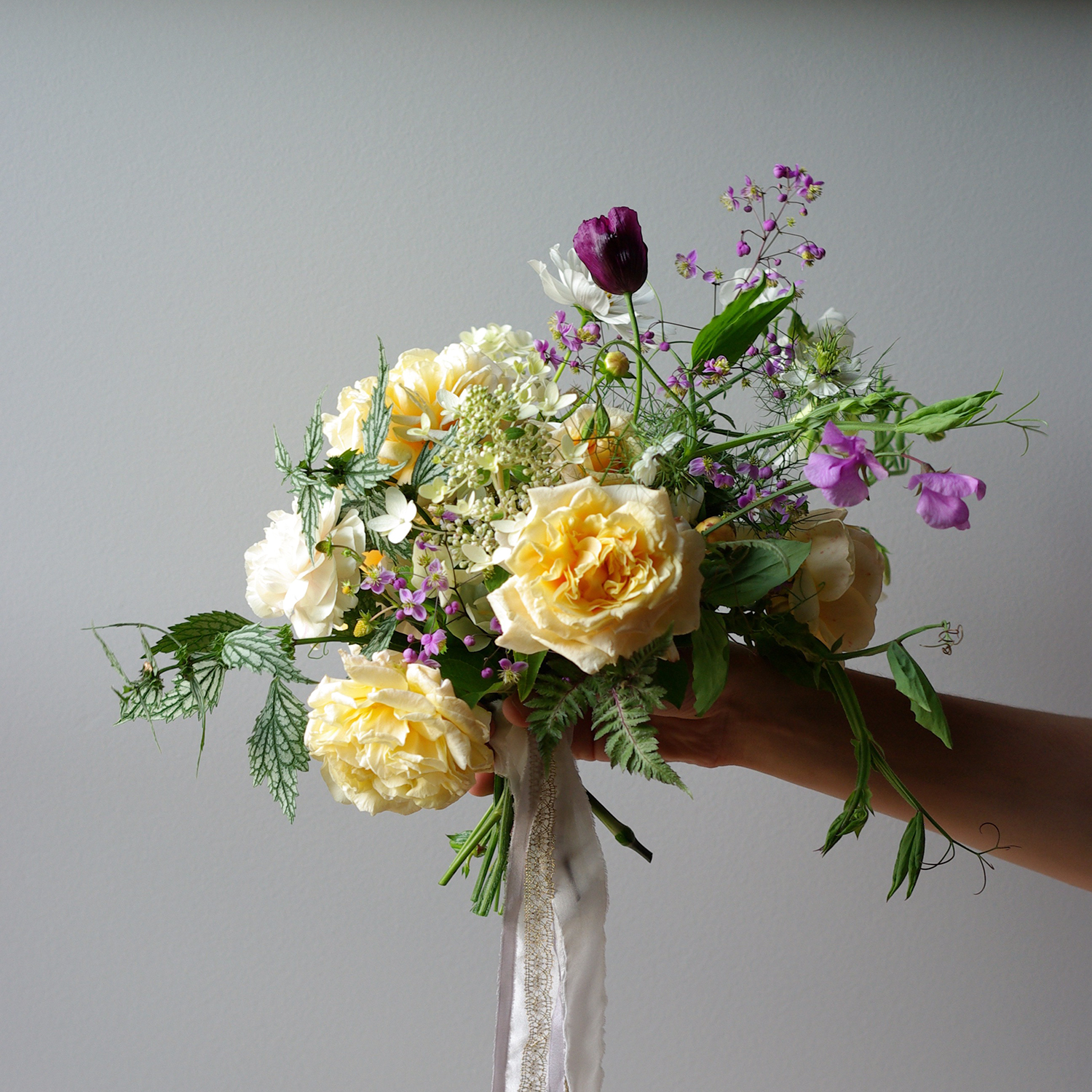 A bouquet with 'Carmella Fairy Tale' and 'Graham Thomas'