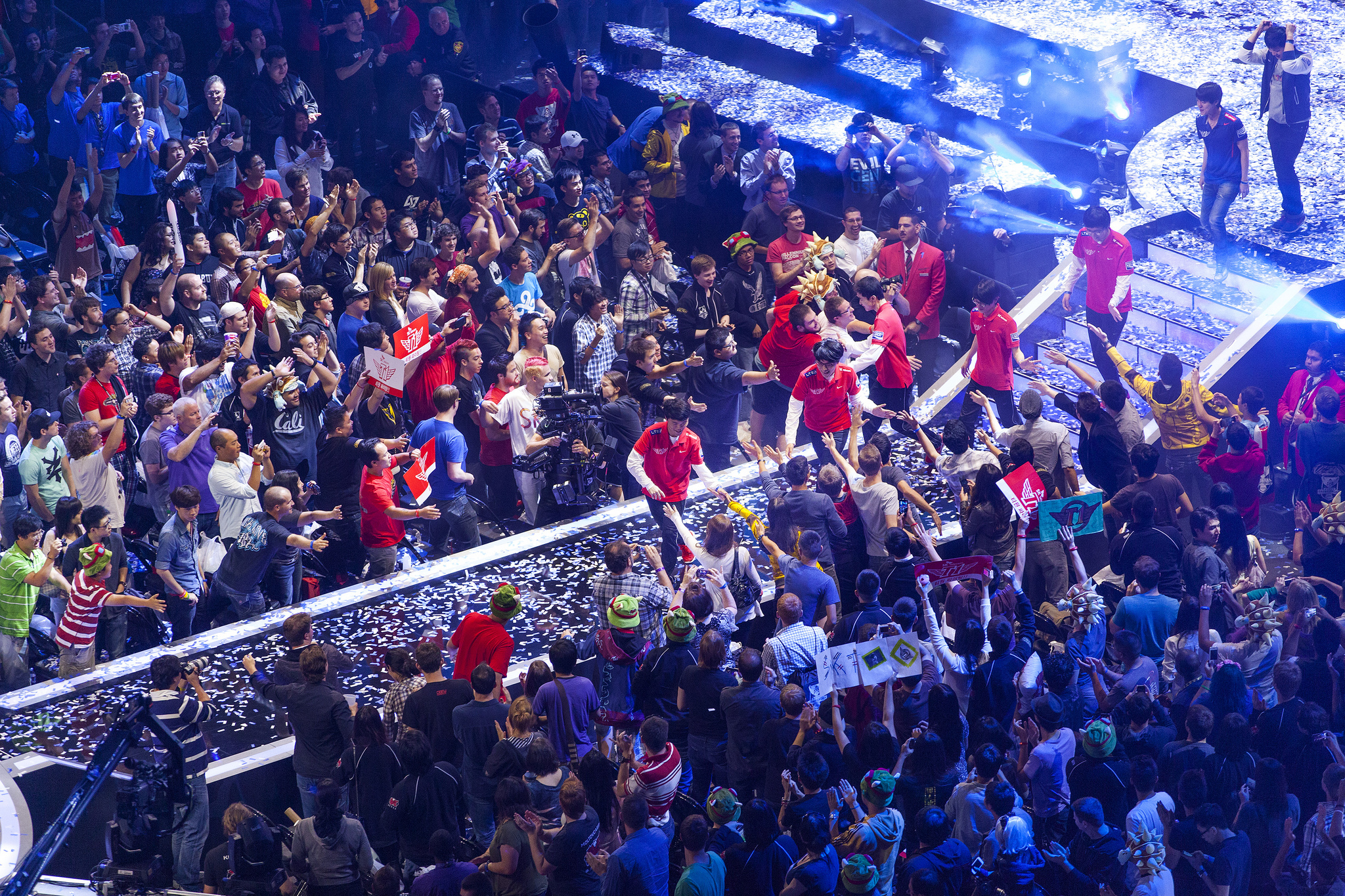 Members of SK Telecom T1 K high five members of the crowd after winning the World Championships 2013. source