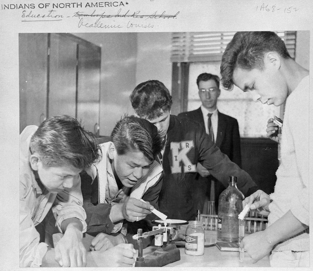 Basil Fox, Photographer. Chemistry Class Kamloops Indian Residential School, British Columbia, ca. 1959 . From: Canadian Government Archives: Residential Schools: Photographic Collections, c. 1959.