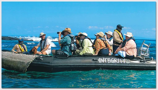 Linda Cayot and Richard Polatty leading Galapagos Conservancy guests aboard Integrity