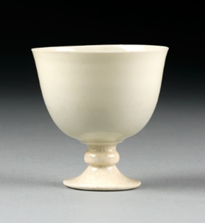 White stem cup, Northern China. Tang dynasty, 600-700 AD. Glazed stoneware. Museum no. C.138-1965.