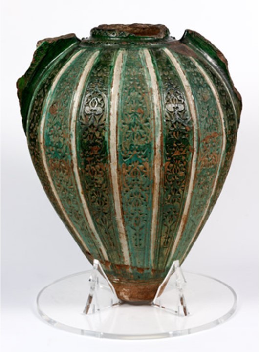 Storage jar, Spain, Granada, 1375-1425 AD. Tin-glazed earthenware, with incised and stamped decoration. Museum no. 125-1897