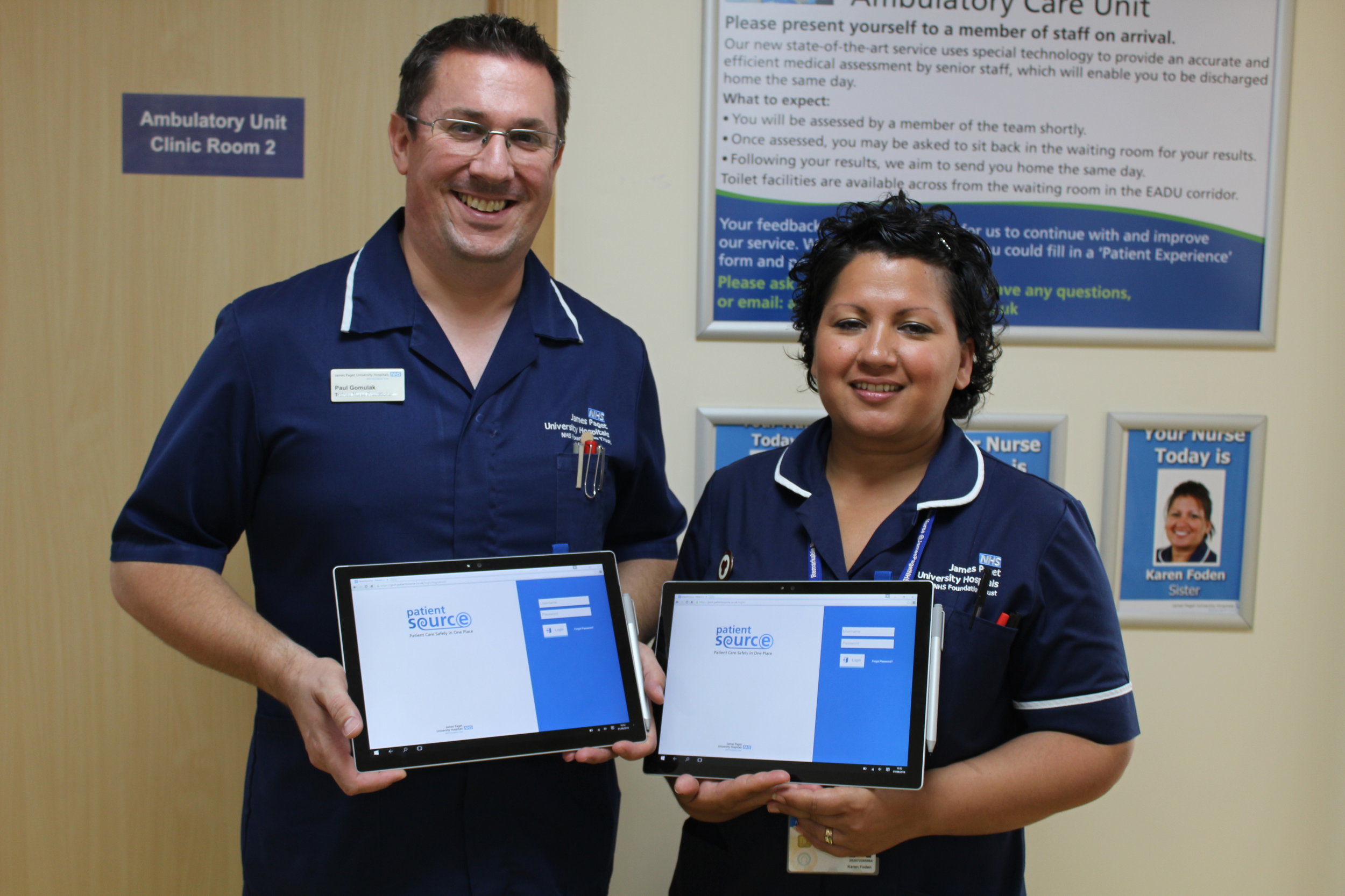 Nurse Practitioners Paul Gomulak and Karen Foden holding the Microsoft Surface 4 Pro tablets which have been loaned to JPUH Ambulatory Care by Microsoft for PatientSource's trial (Photography by Laura Crisp)