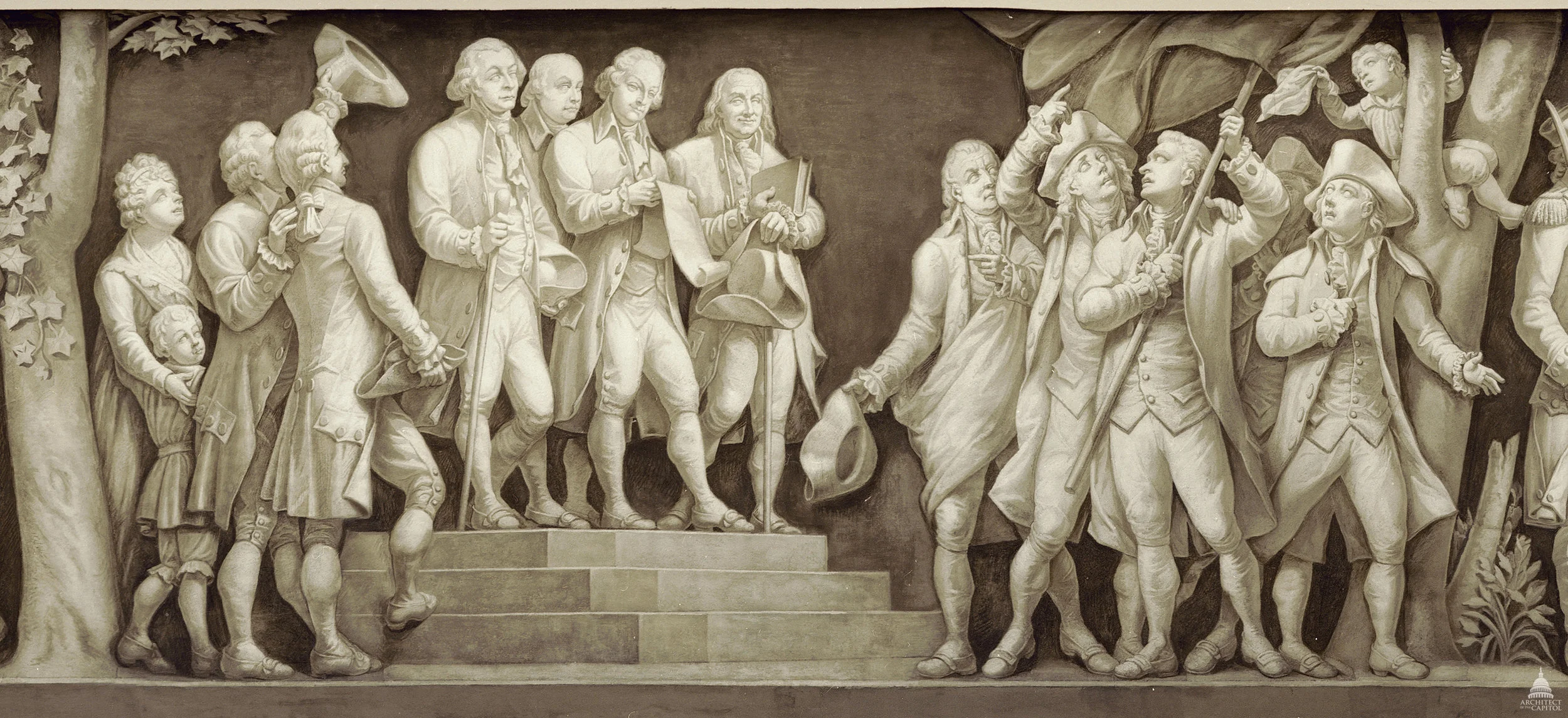This idealized depiction shows the principal authors of the Declaration of Independence, John Adams, Thomas Jefferson and Benjamin Franklin, reading the document to colonists in 1776. From the frieze of American history in the Rotunda of the U.S. Capitol. Photo by Architect of the Capitol.