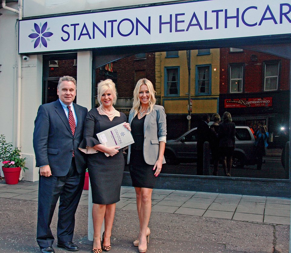 Rep. Chris Smith, Bernie Smyth and Brandi Swindell (l-r) outside Stanton Healthcare on Greater Victoria Street.
