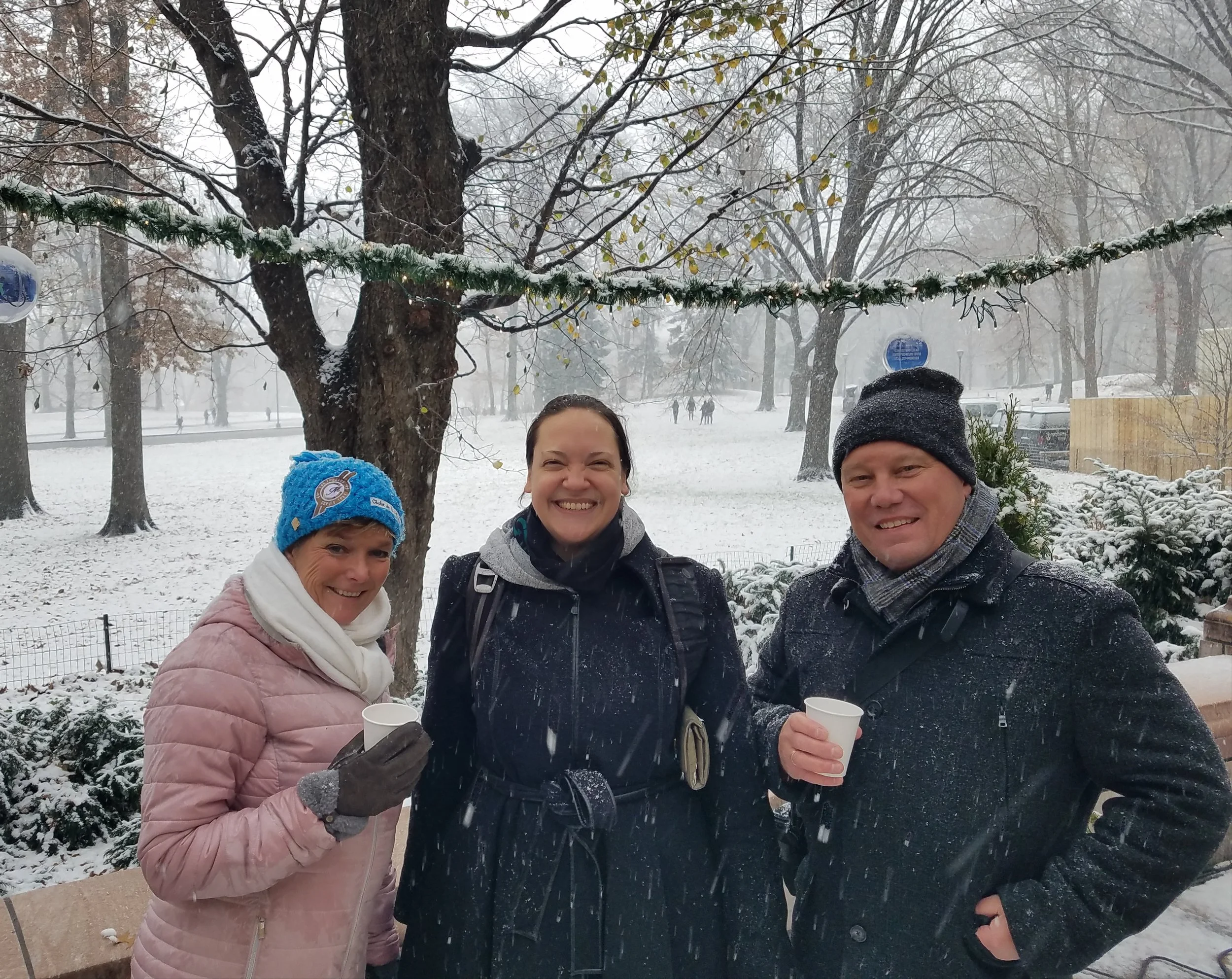 An extra special group for a New York tour guide--some Dutch guests enjoying the snow and hot beverages for a very festive feasting indeed!