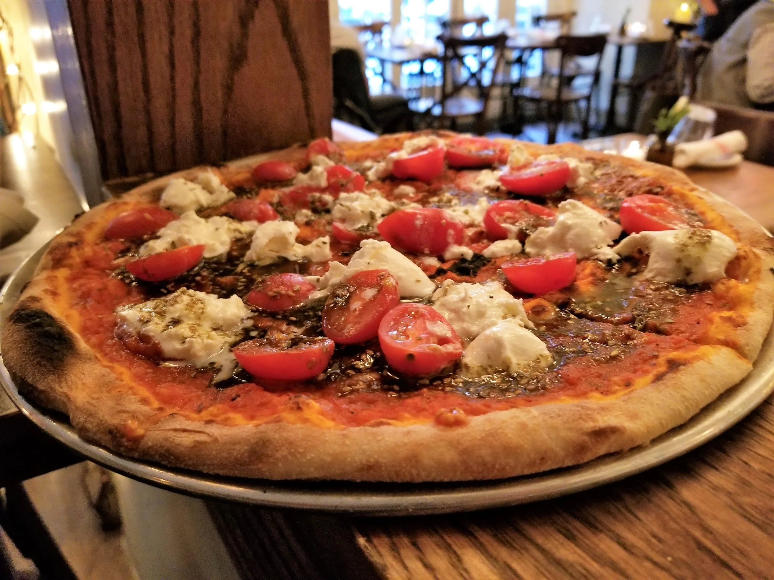 Buratta Pizza: Maine buratta, cherry tomatoes, za’atar