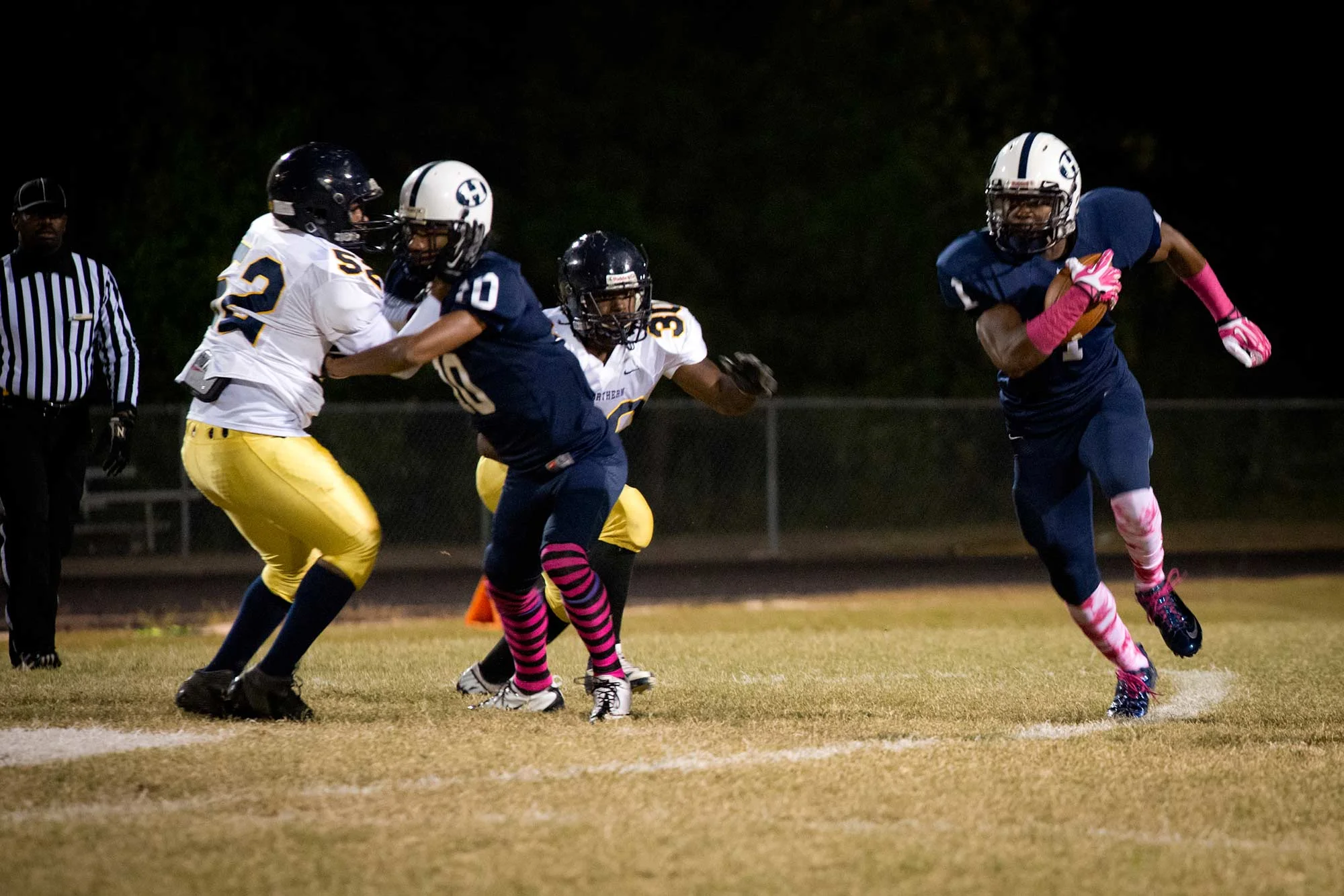 Trevion Thompson runs the ball for a touch-down. Thompson, a nationally-ranked senior, began playing football at age 9, moving from quarterback to wide receiver during his time at Hillside. "It's great to be part of a winning program. I love having the opportunity to get out there and compete every day," says Thompson.