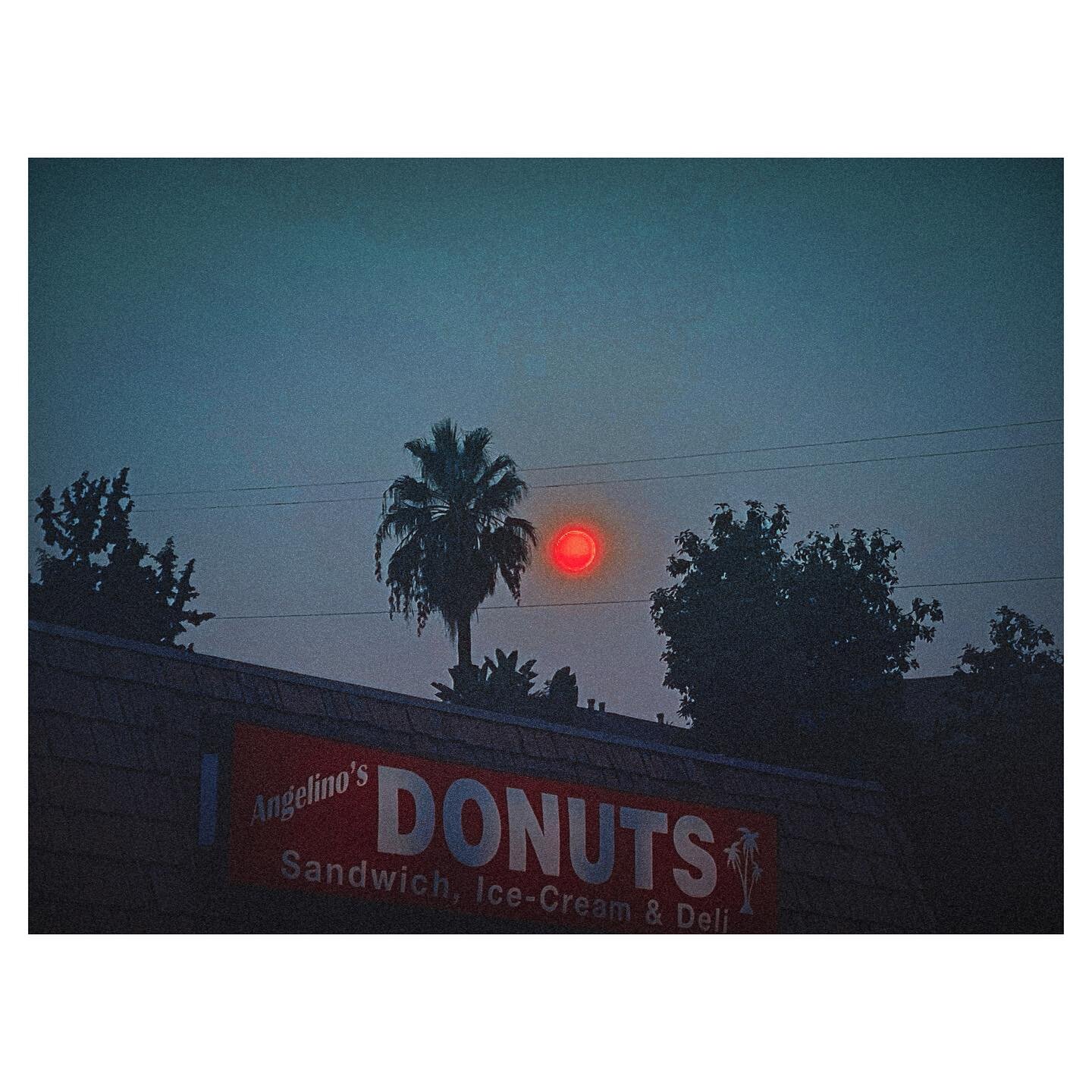 Wildfires making the sun red the other day #EchoPark
