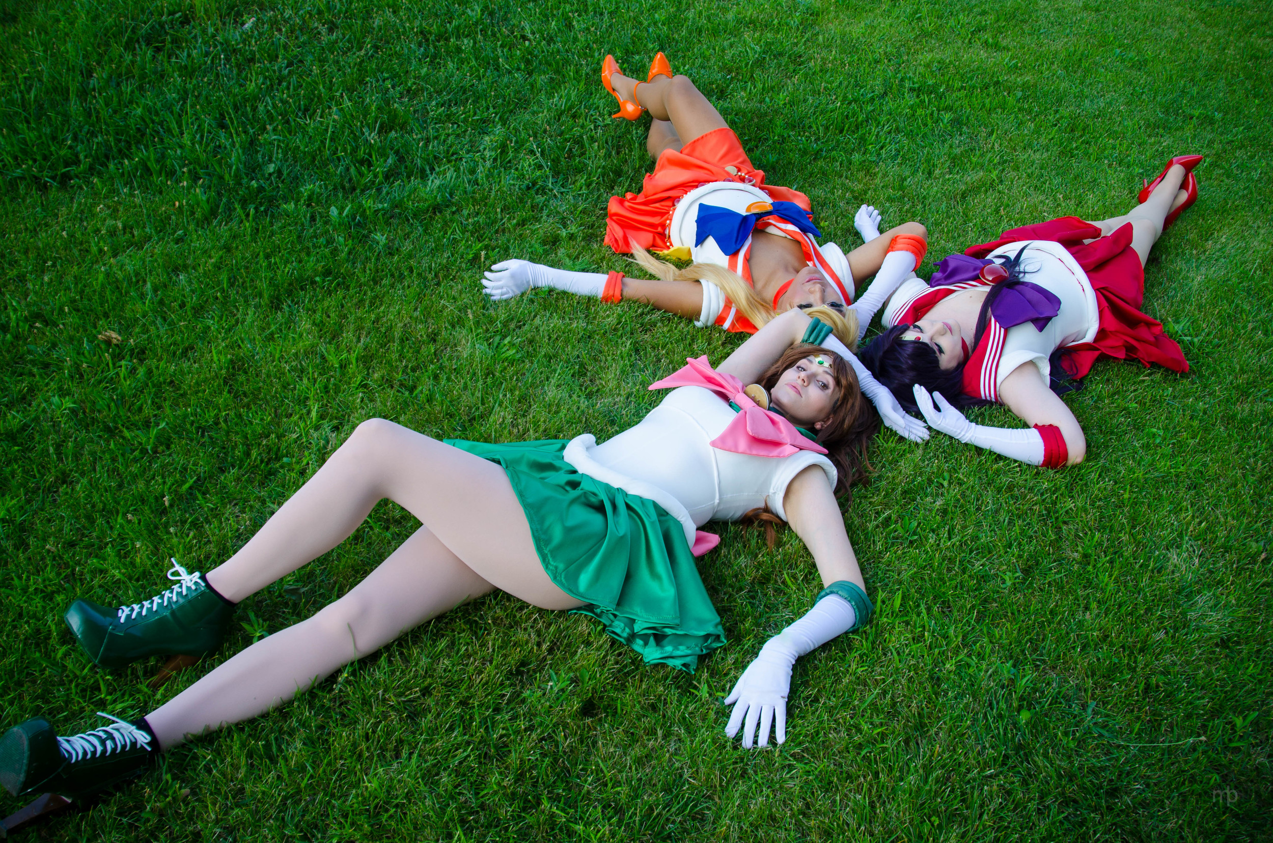 Sailor Venus, Sailor Mars, and Sailor Mercury from Sailor Moon. This portrait was taken at Motaku 2014.