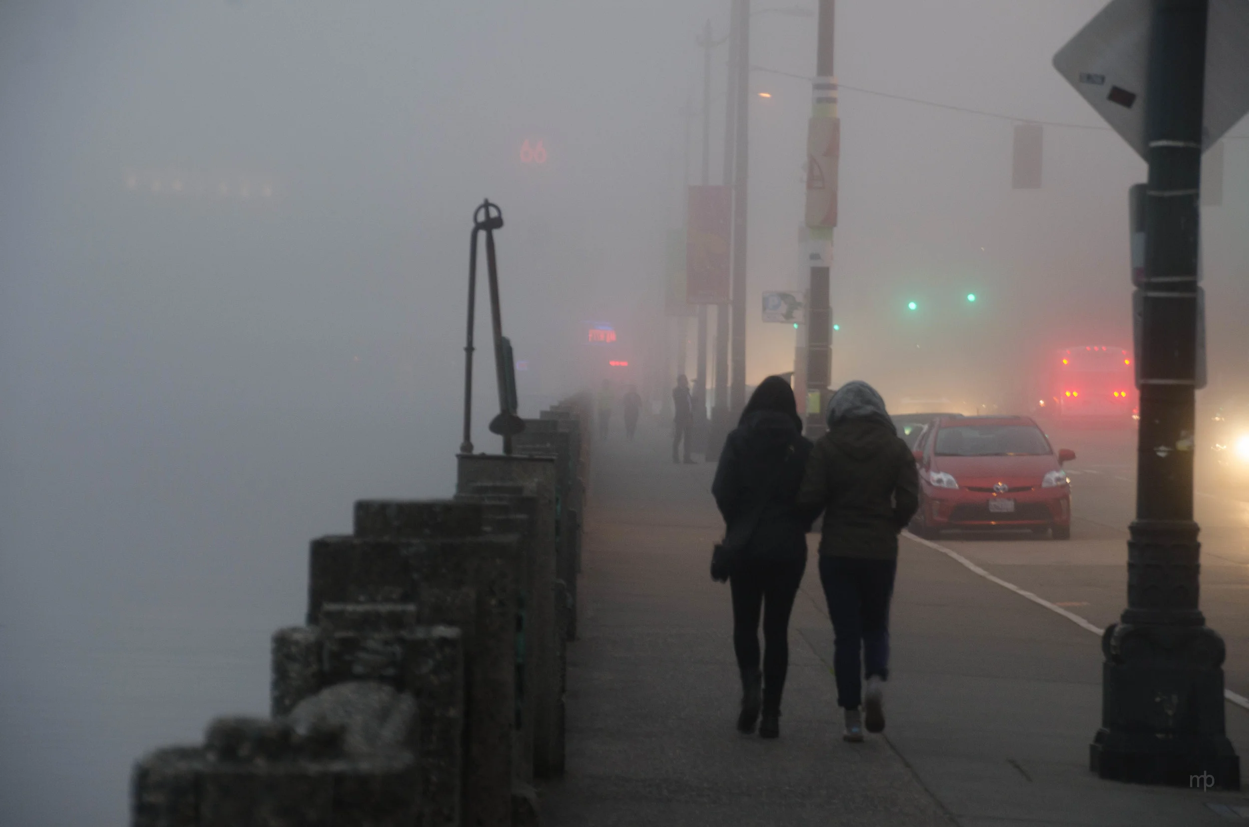 A walk in the Fog. A foggy evening at the Seattle Waterfront. Seattle 2013