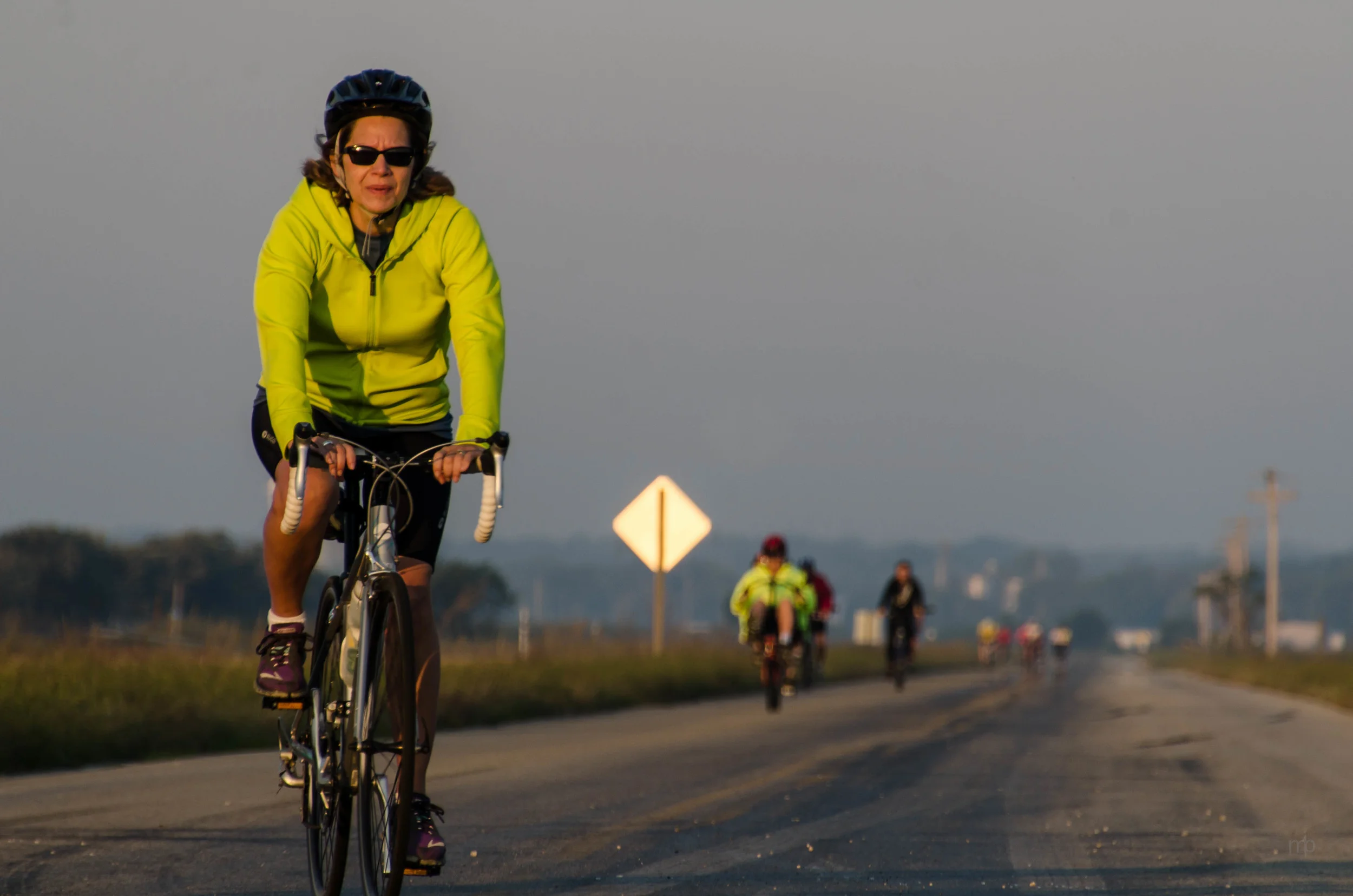 Yellow Brick Road Bike Rider. Nikon D7000, Tamron 18-270, ISO100, 270 mm, f/8.0, 1/160 sec