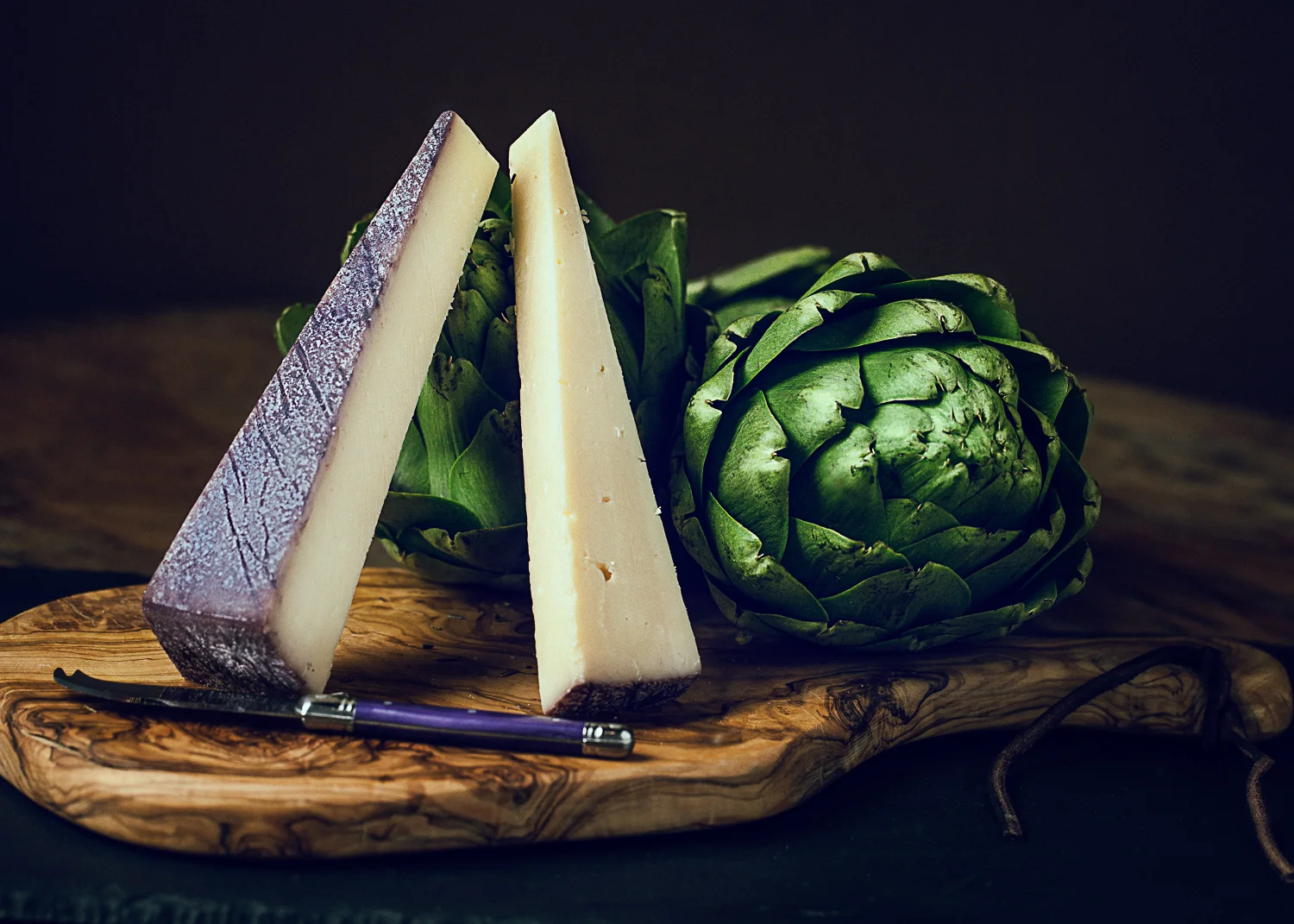 elegant cheese on a cutting board