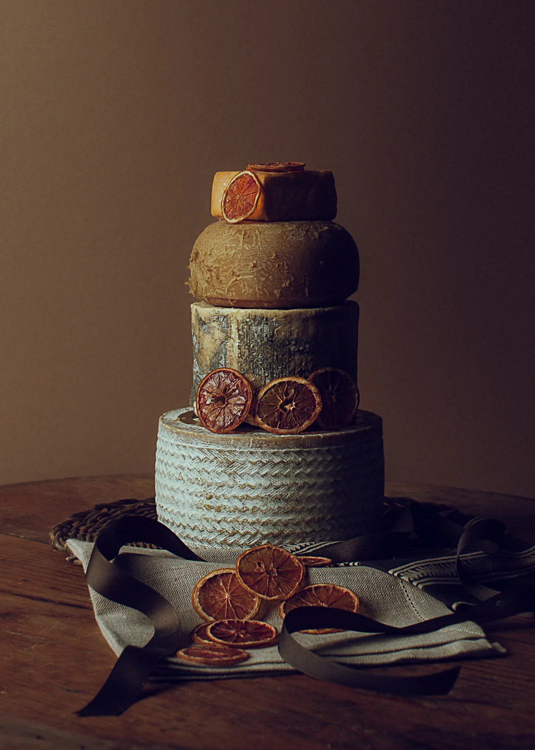 a tower of aged cheeses