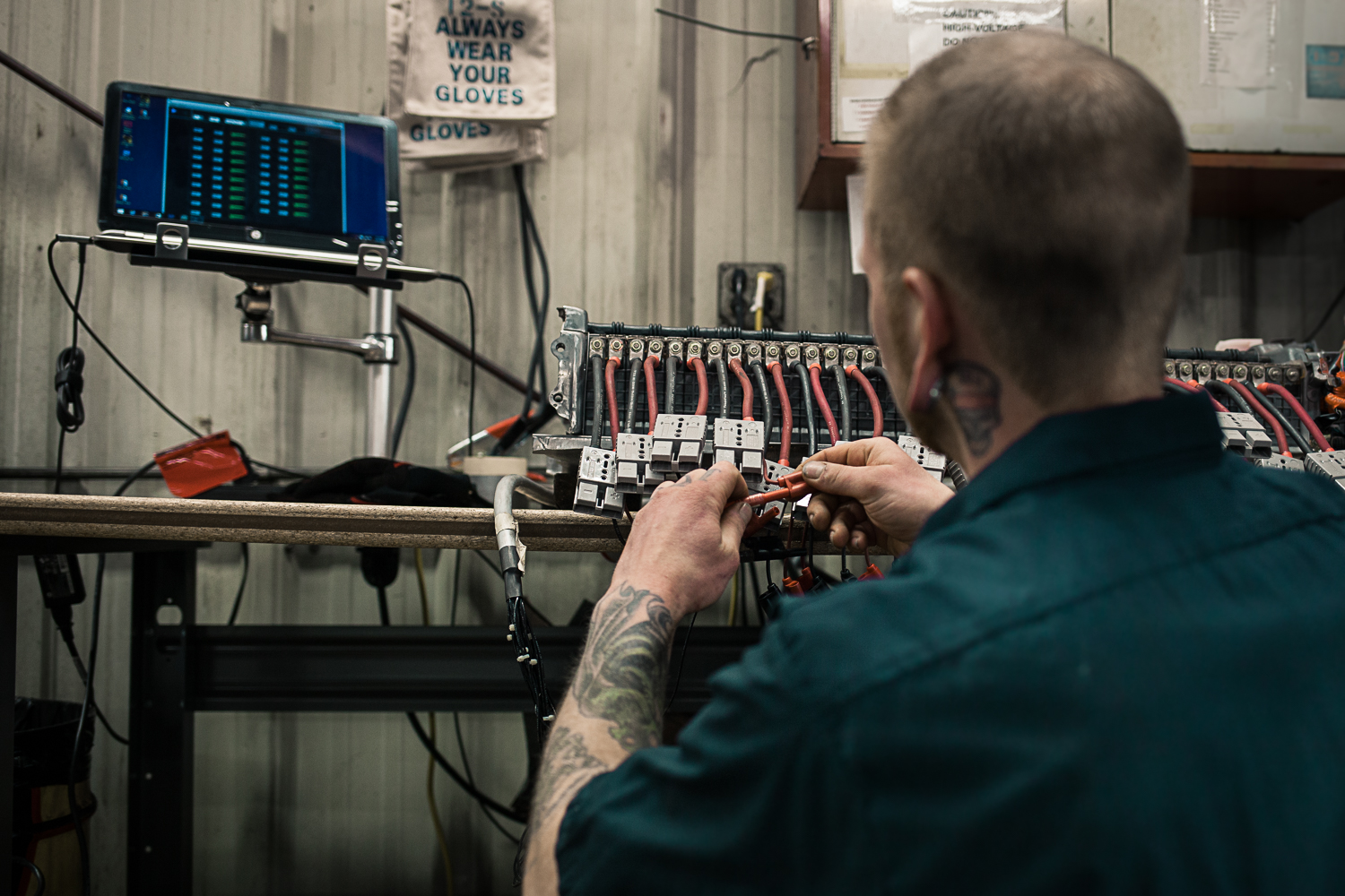 guy working on car battery