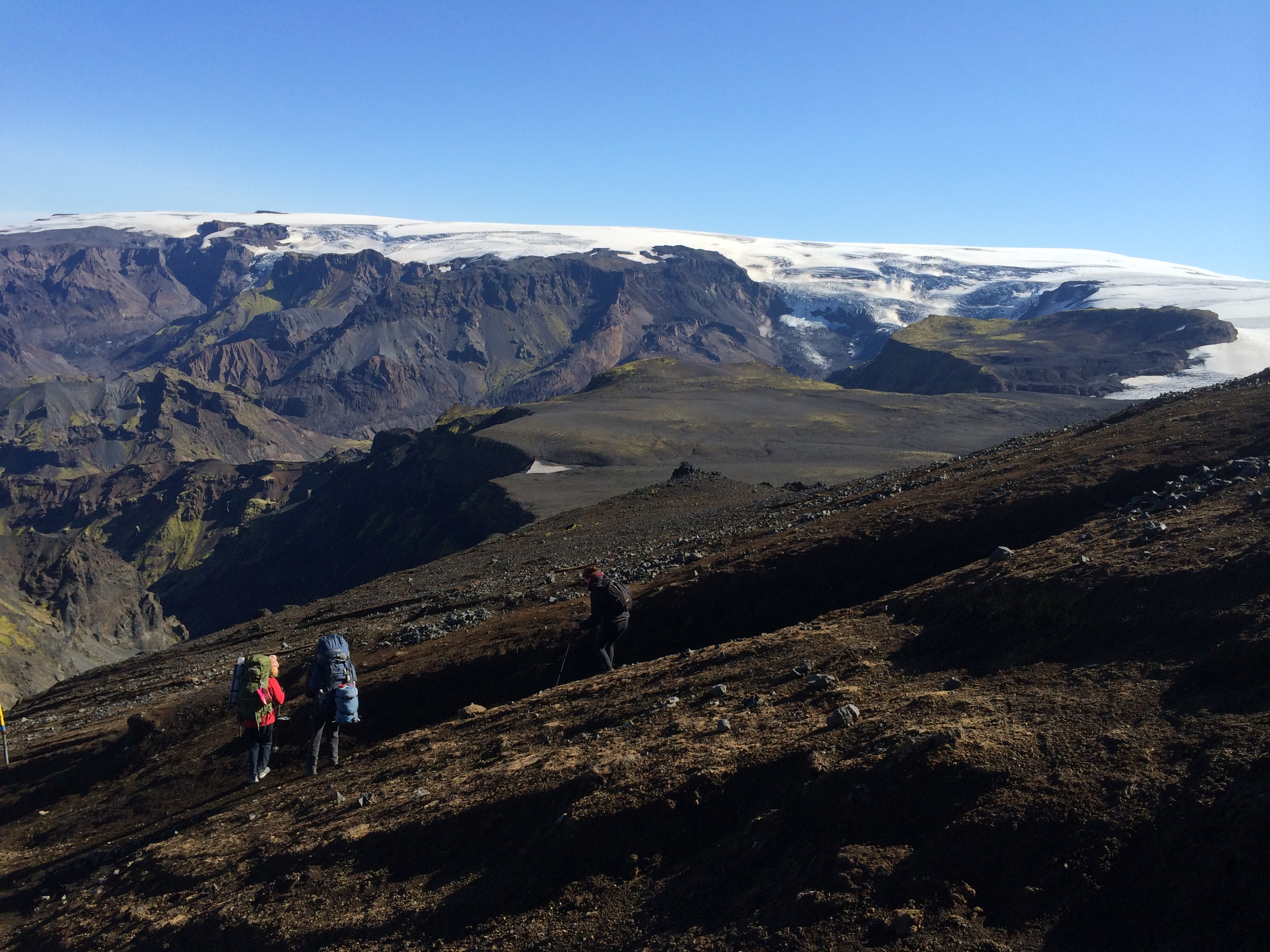 Walk down the mountain and watch the Eyjafjallajökull
