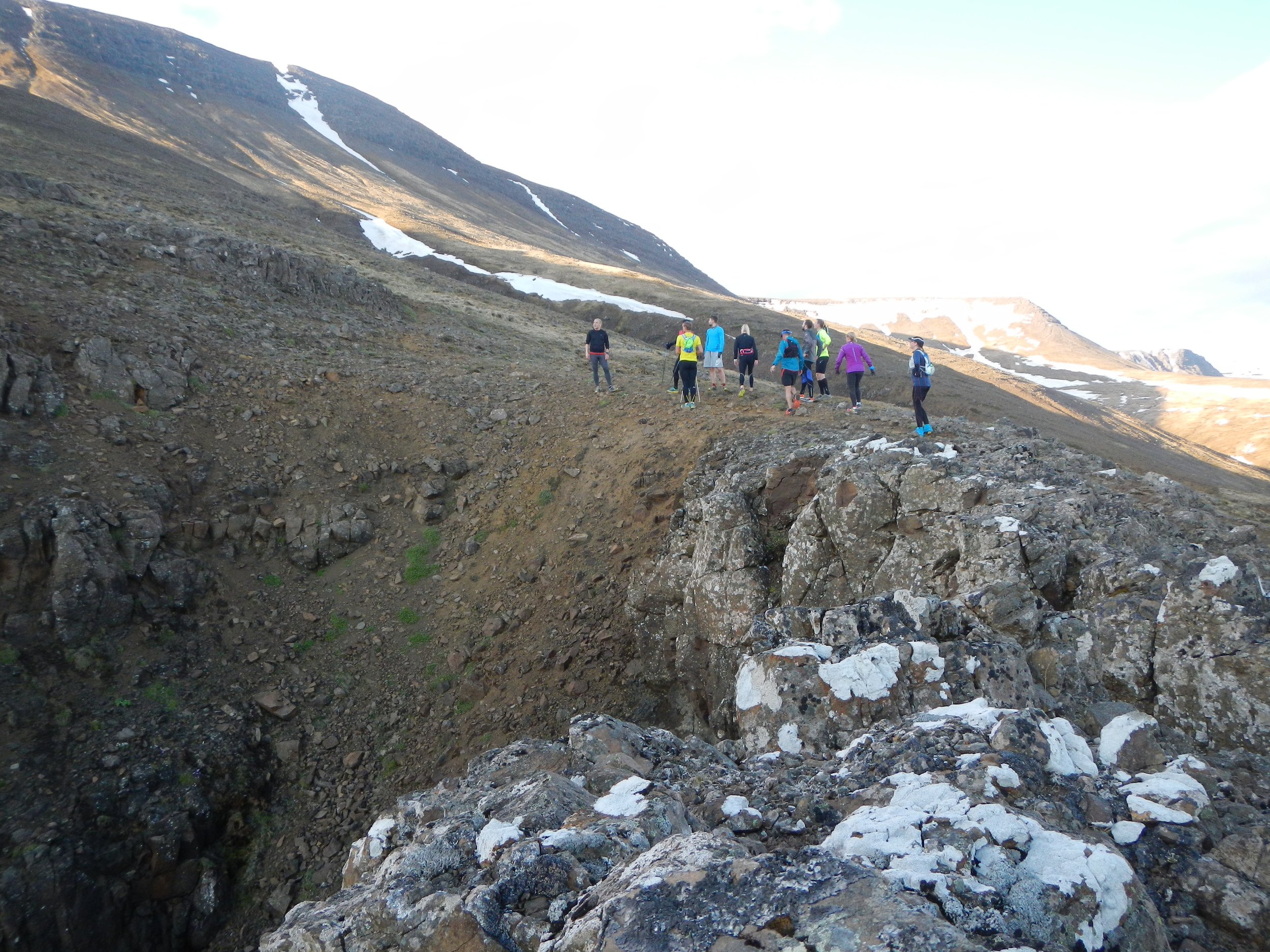 A running group looking upwards in Mt. Esja