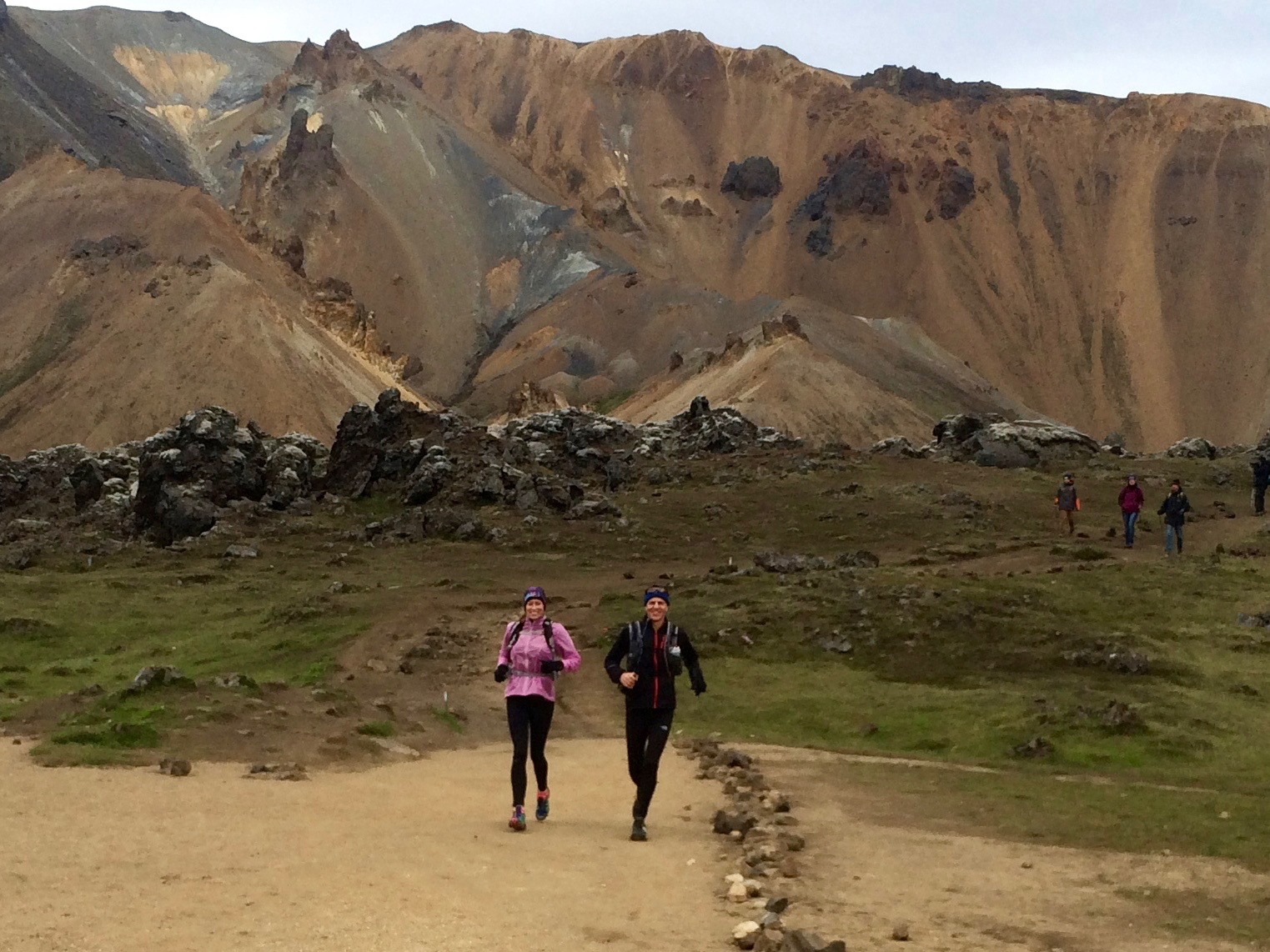 Running with rhyolite mountain side in the background