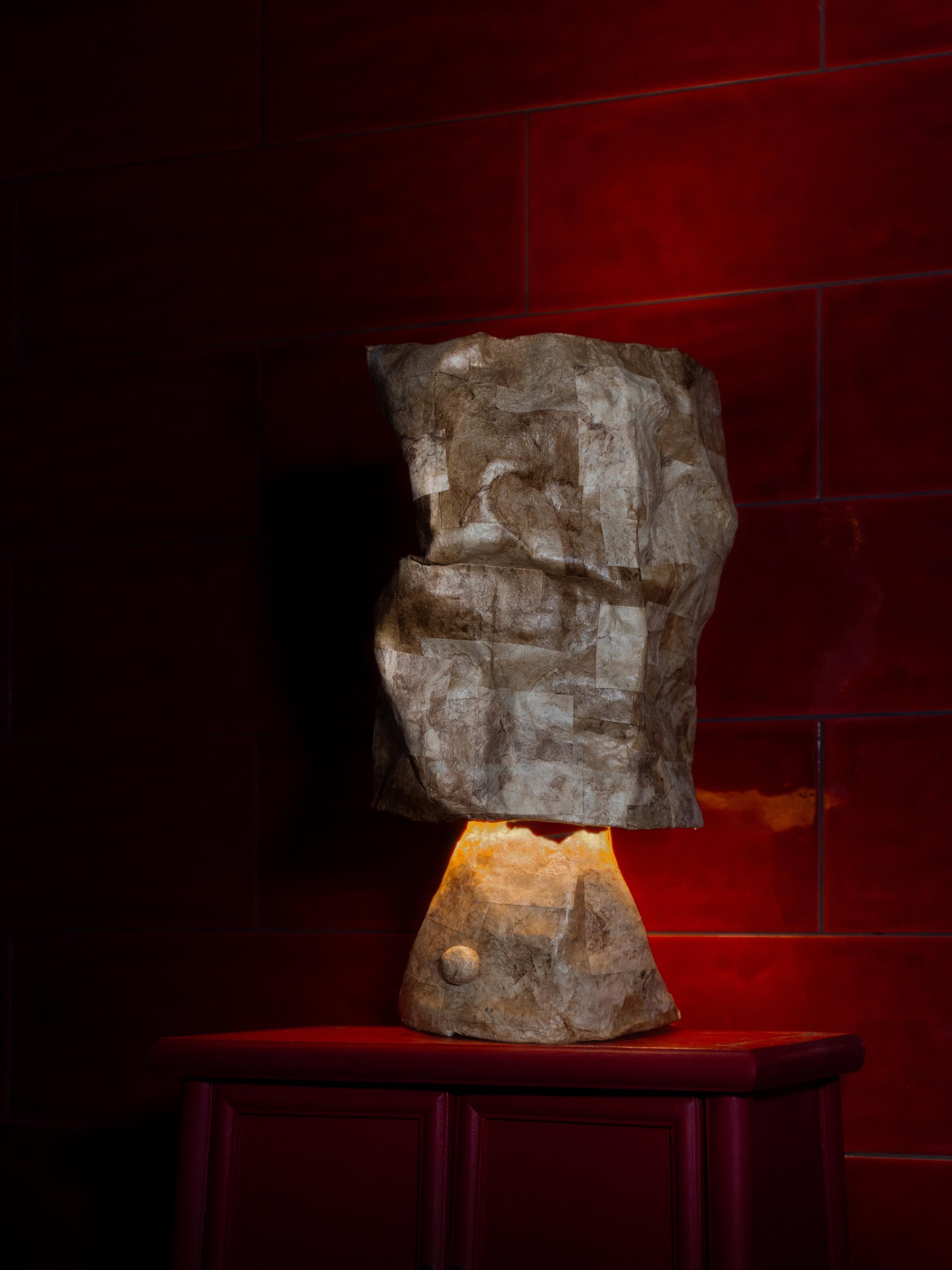 Samuel+Aguirre_Fiber+Table+Lamp+Amate+on+red+LAMP+ON_Photo+Cred+Travis+Lemire.jpg