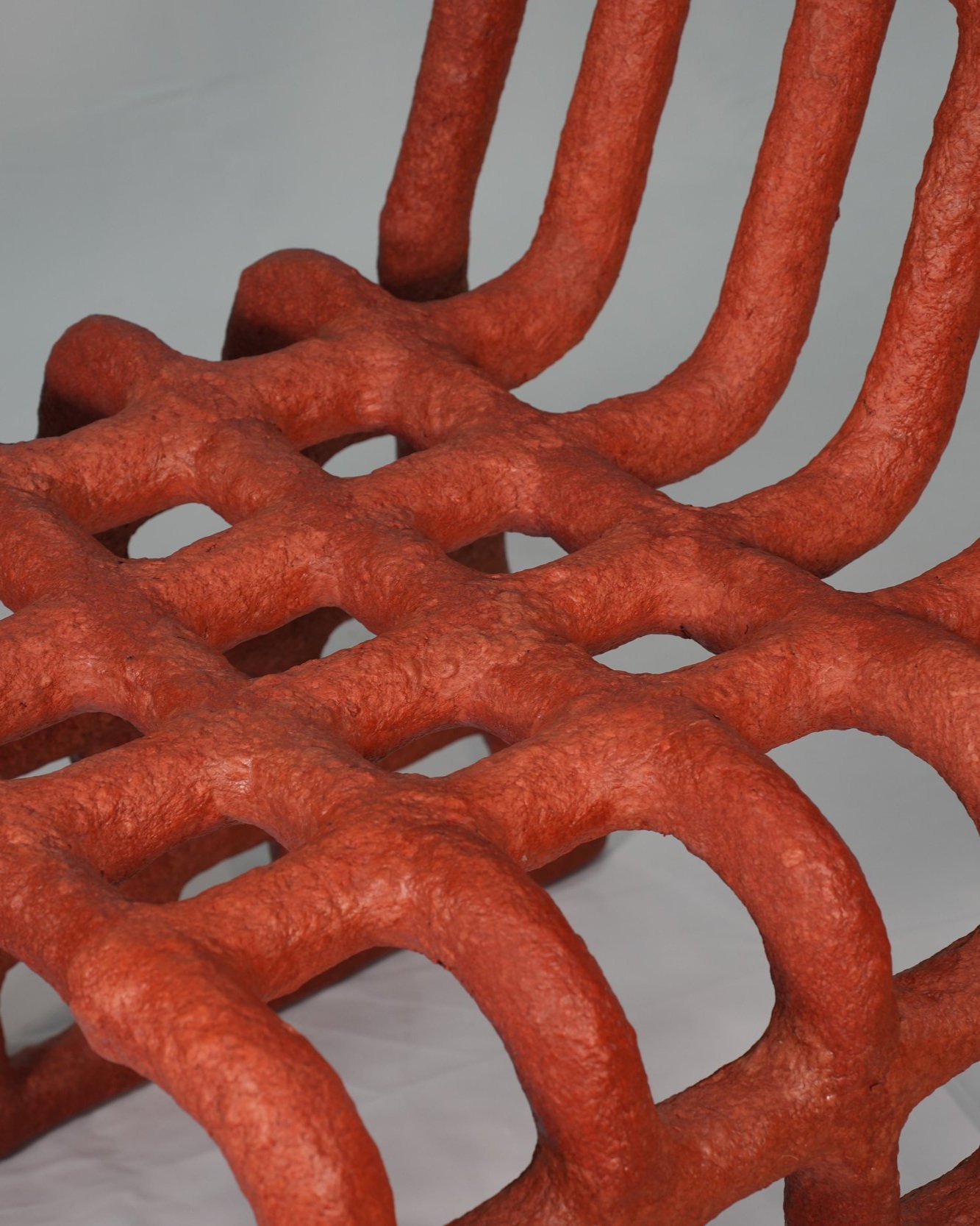 Samuel+Aguirre_Chair+03+Red+Iron+Oxide+on+White+4_Photo+Cred+Travis+Lemire.jpg