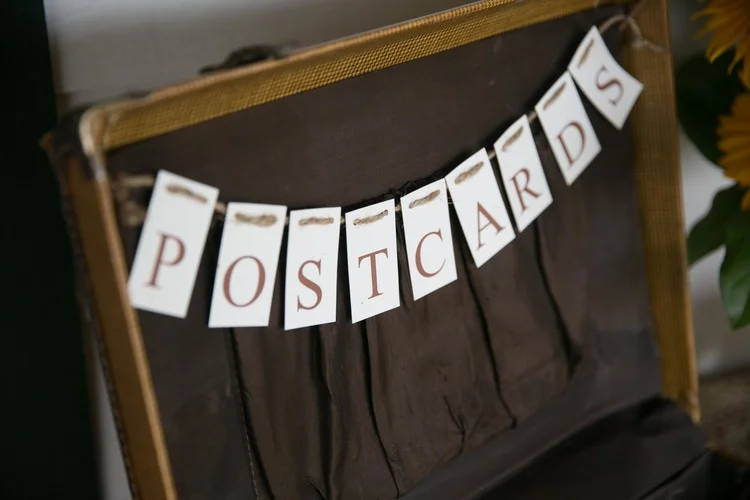 postcard suitcase guest book